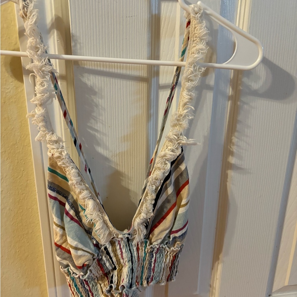 Cropped going out top